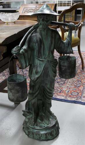 A green patinated bronze Chinese bronze with yoke, 20th C.