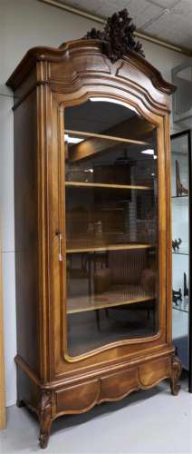 A Louis Quinze style one-door display cabinet, 19th century.
