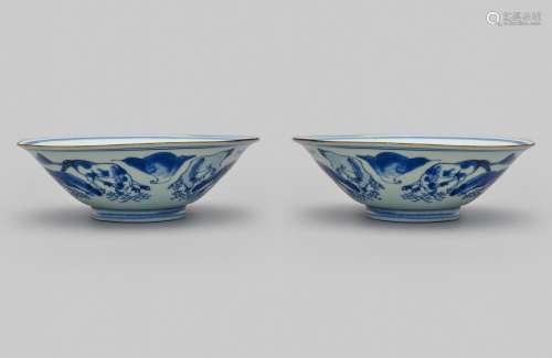 A pair of blue-and-white 'horse' conical bowls
