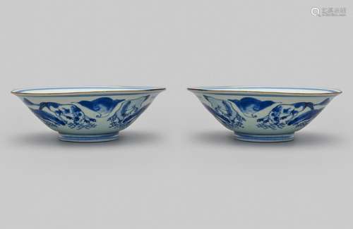 A pair of blue-and-white 'horse' conical bowls