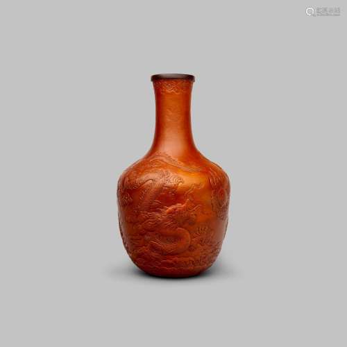 A moulded gourd 'dragon and cloud' vase