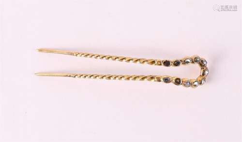 A gold tie clip, set with rose-cut diamonds, 19th century.