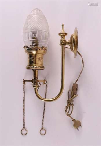 A brass gas Jugenstil wall lamp with glass shade, around 190...