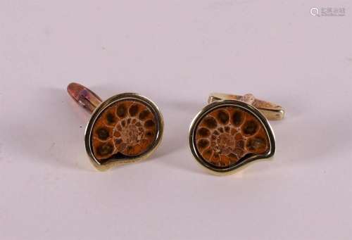 A pair of gold-plated silver cufflinks with fossil Ammonite.