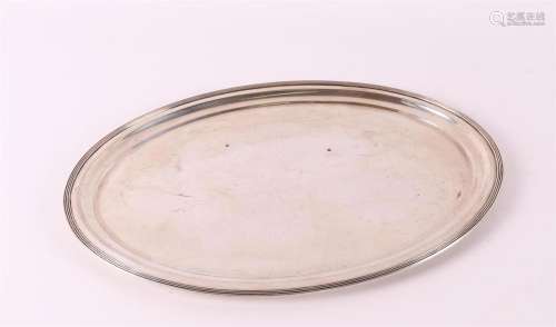 A silver oval filet-rimmed platter, 20th century.