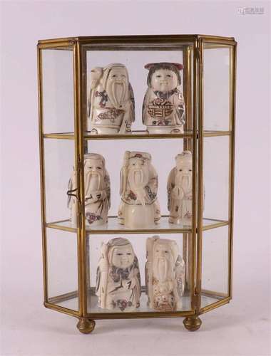 Seven bone netsukés in brass display case, Japan, late 20th ...