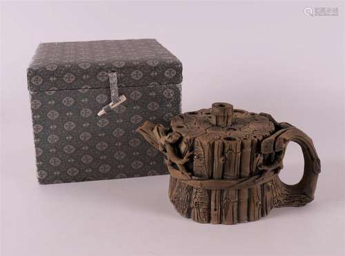 A tree trunk-shaped yixing teapot, China 20th century.