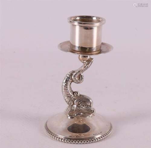 A 2nd grade silver 1 light candlestick with decoration of a ...
