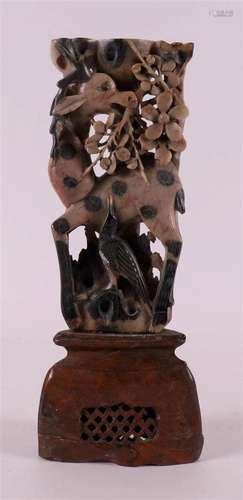 A carved soapstone incense burner with deer and flora, China...