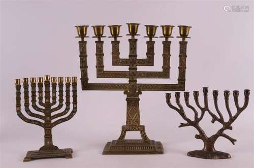 Judaica. A brass menorah candlestick 'Israel-JK7W'...