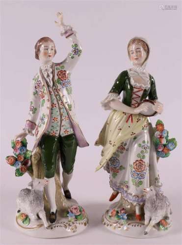 Two polychrome porcelain figures of a man and woman, Germany...