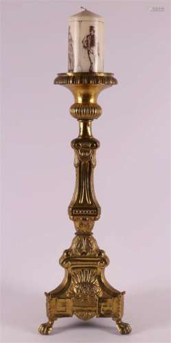 A gilt brass church candlestick, 19th C.