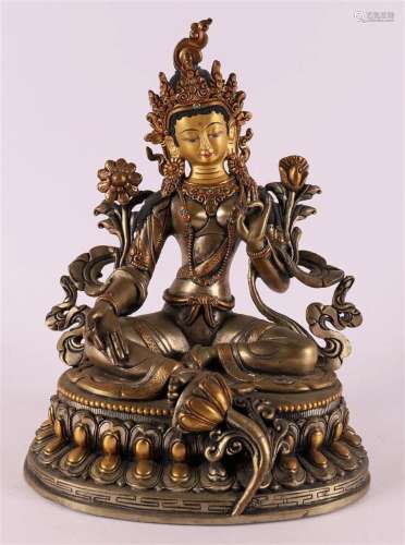 A brown patinated bronze and gilt Tara on lotus crown, Thail...