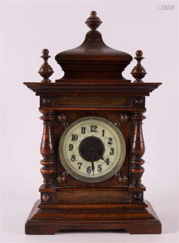 A table clock in walnut casing, Germany, Junghans around 190...