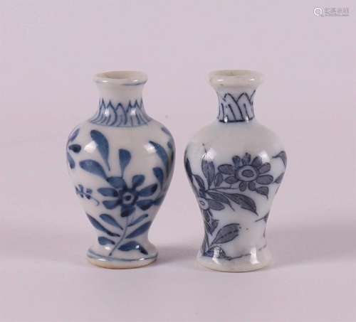 Two blue/white porcelain etagère vases, China, Kangxi, aroun...