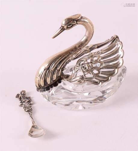 A clear crystal and 2nd grade silver salt shaker of a swan, ...