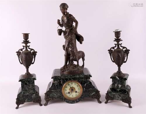 A three-piece mantel clock set, France 19th century.