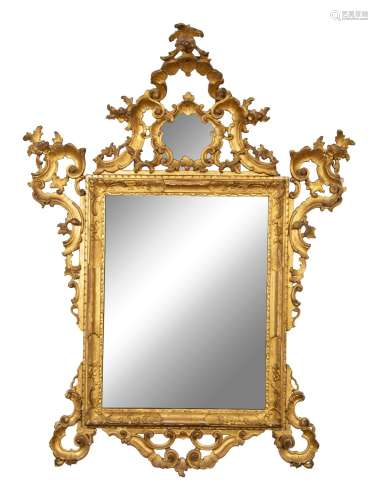 An Italian Rococo Carved Giltwood Mirror Height 43 x width 4...
