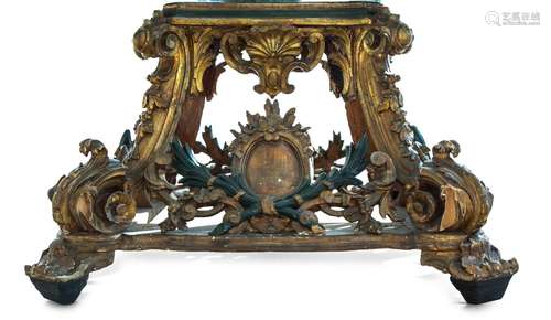 A Venetian Painted and Parcel Gilt Carved Wood Table Base He...