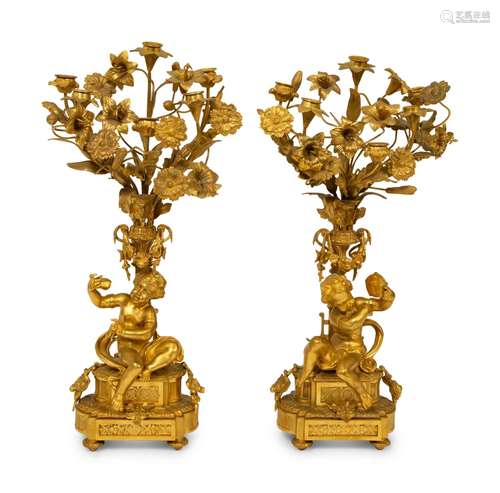 A Pair of Louis XV Style Six-Light Gilt Bronze Figural Cande...