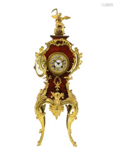 A French Gilt Bronze Mounted Tortoiseshell Veneered Clock He...
