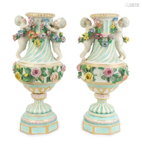 A Pair of German Porcelain Urns Height 13 1/2 x diameter 6 1...