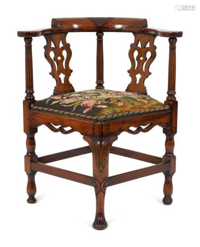 A William IV Carved Walnut Corner Chair Height 32 x width 28...