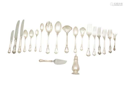 An Assorted Set of American Silver Flatware Length of dinner...