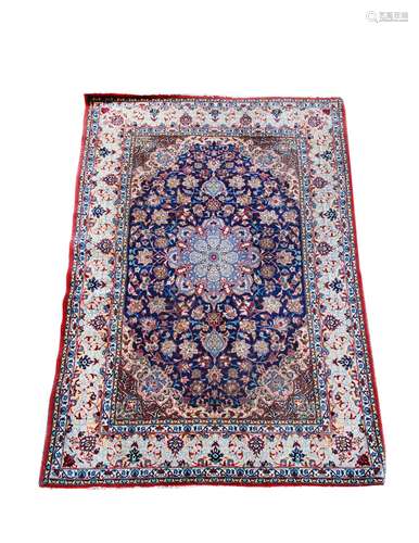 A Tabriz Wool and Silk Rug 5 feet 4 1/2 inches x 3 feet 5 in...