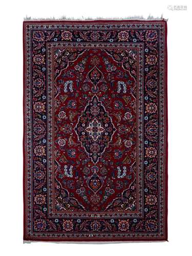 A Tabriz Wool Rug 5 feet 8 inches x 3 feet 7 inches.