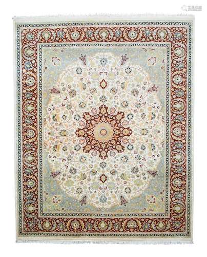 A Tabriz Design Wool Rug 10 feet 7 inches x 8 feet 1 inch.