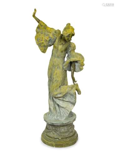 An Art Nouveau Patinated Bronze Figure of Woman is Flowing D...
