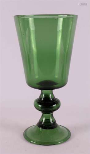 A green glass goblet, early 20th century.