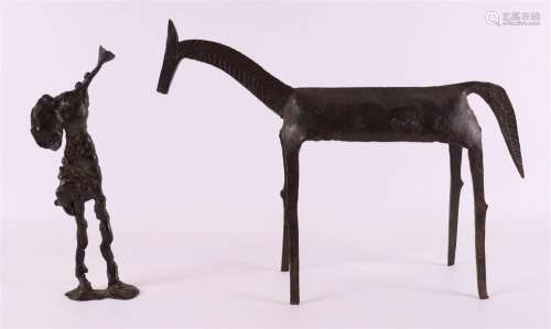 A bronze trumpet elephant and metal horse.