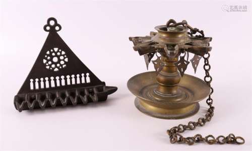 A brass shabbath oil lamp, 19th century.