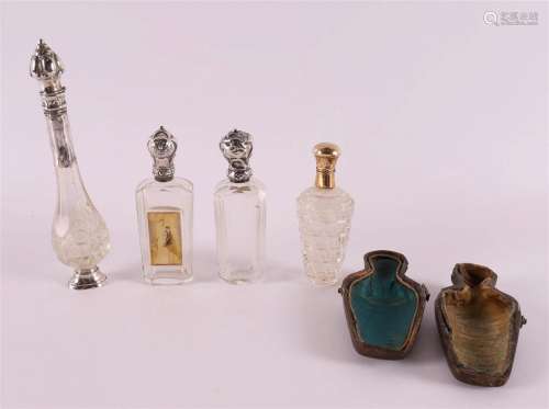 A series of four various odor flasks with gold and silver cl...