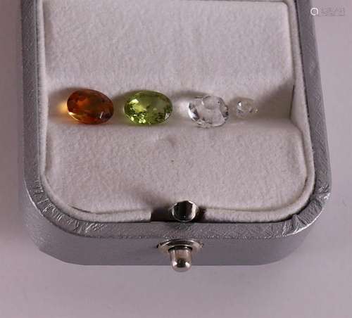 A loose citrine and peridot.