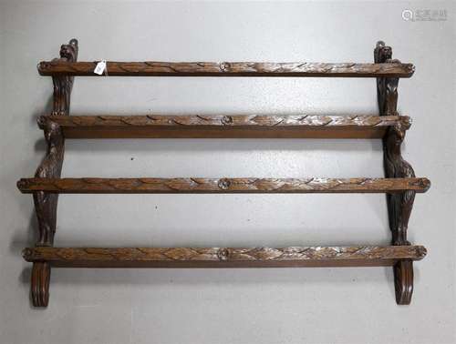 An oak plate rack, late 19th century.