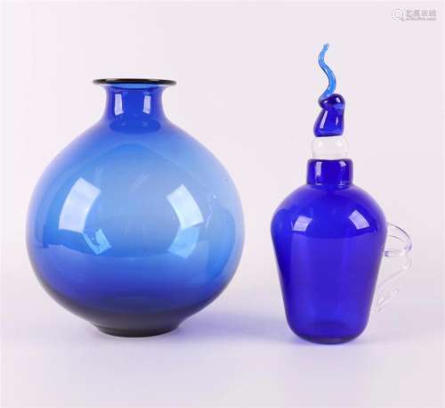 A blue glass design carafe, England, Emma-Louise Kirkham