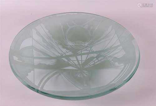 A partly satin-finished clear glass bowl with abstract flora...