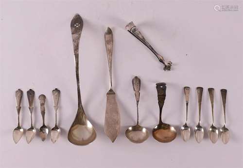 A lot 2nd grade 835/1000 silver, including cream spoon, sauc...