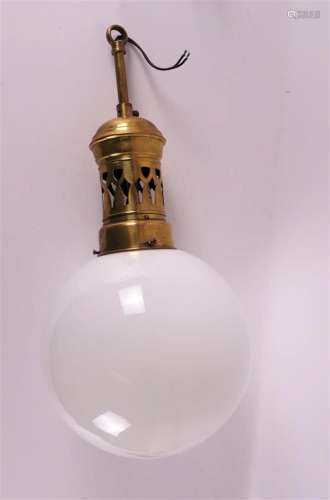 A brass hanging lamp with a spherical white glass shade, 1st...