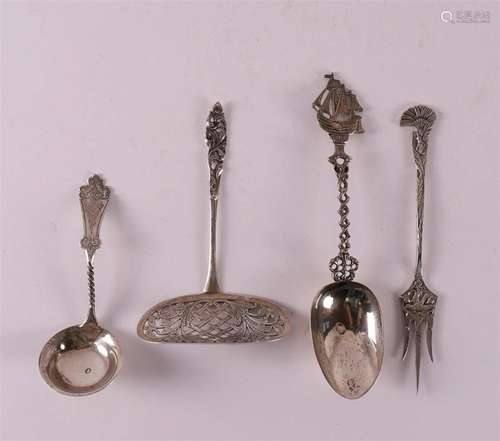 A lot 2nd grade 835/1000 silver, including memorial spoon an...