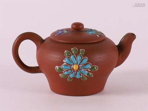 A Yixing miniature teapot with polychrome floral enamel deco...