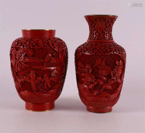 Two various red lacquer vases with relief decor, China, 20th...