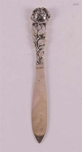 A grade 2 silver letter opener with a rose decoration, 1929.