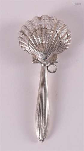 A 2nd grade 835/1000 silver rattle with shell-shaped bowl, 2...