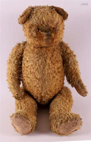 A brown plush teddy bear with hum, ca. 1930