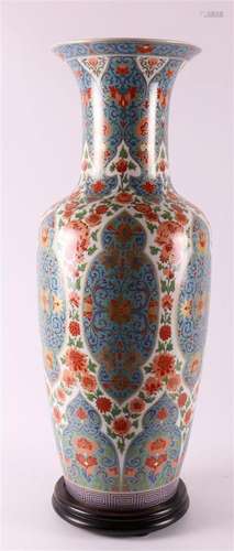 A porcelain baluster-shaped 'Wuhan' vase on a loos...