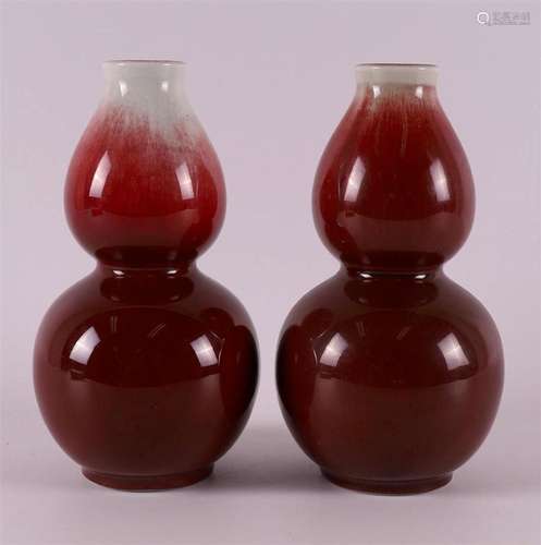 A pair of porcelain sang de boeuf vases, China, antique exam...